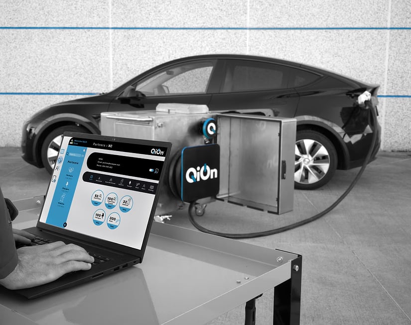 QiOn charging station with electric vehicles